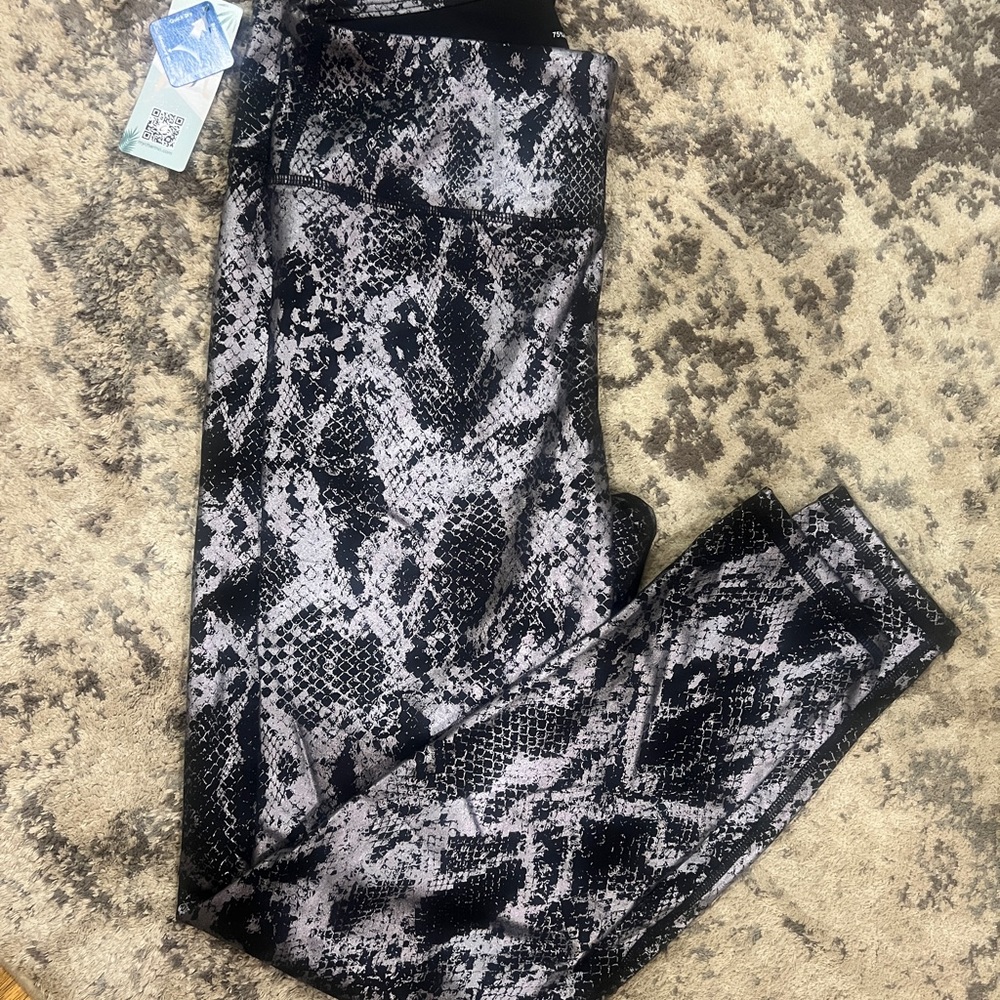 Animal print leggings.  Black and silver metallic.